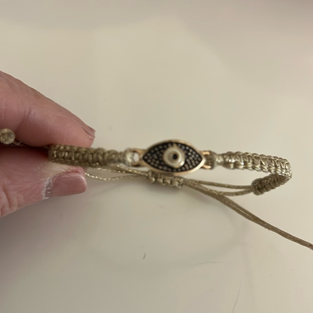 Evil Eye gold band adjustable bracelet.  New.
